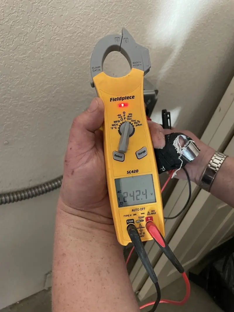 Voltage testing with clamp meter during Generator Installation in Taylorsville